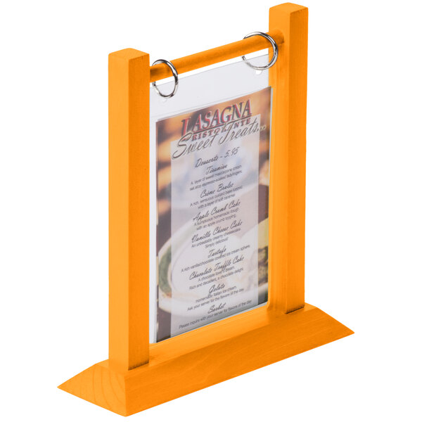 A white wooden Menu Solutions table tent with a wood frame.