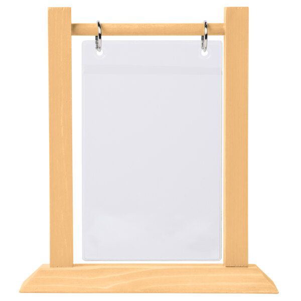 A natural wood flip top table tent with white rectangular paper inside.