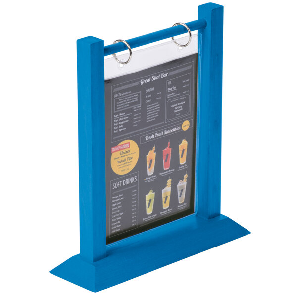 A Menu Solutions True Blue Wood Flip Top Table Tent on a table.