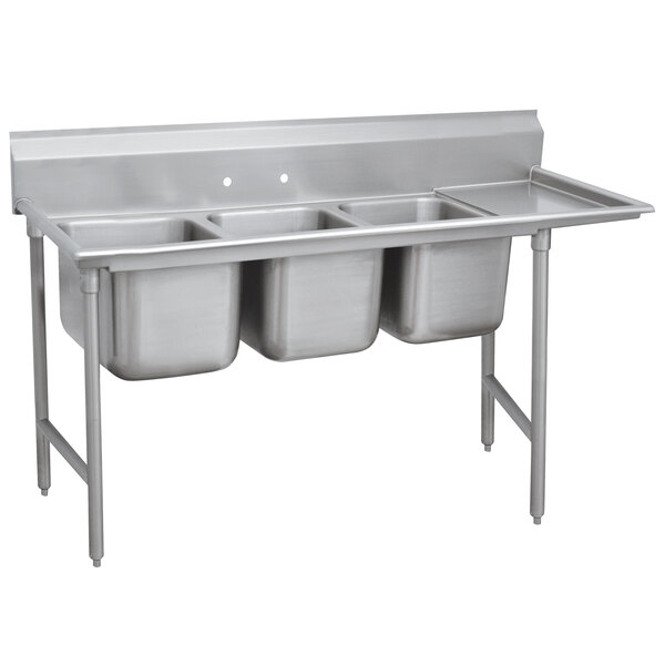 a stainless steel sink with three sinks