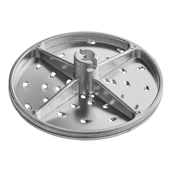 A silver metal Vollrath shredding plate with holes in it.