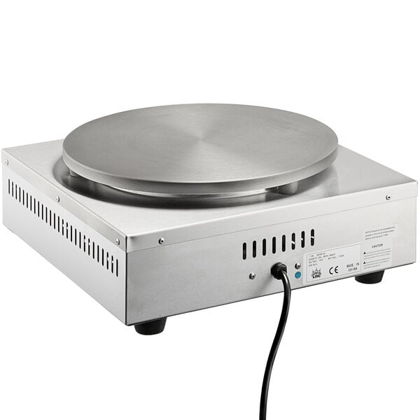 A close-up of the metal plate on a Carnival King 16" Crepe Maker.