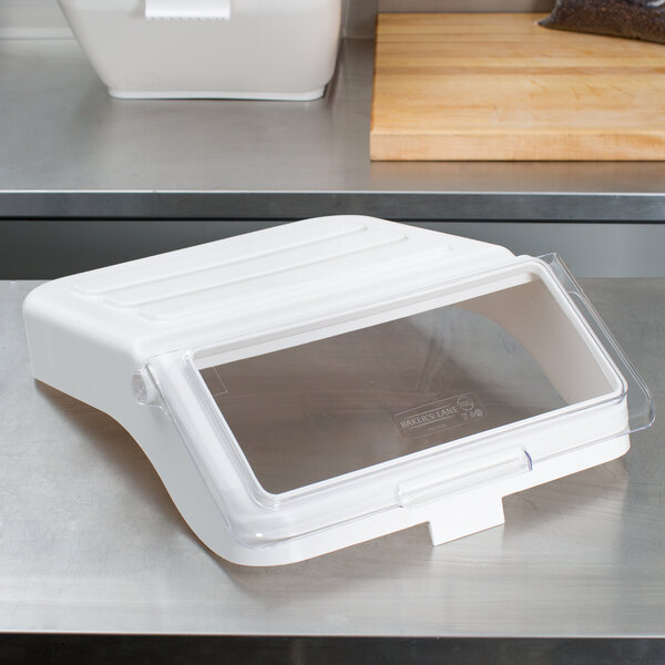 A white Baker's Lane ingredient bin with a clear plastic lid.