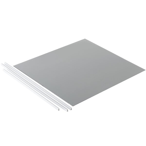 A close-up of a grey square with white strips on it.