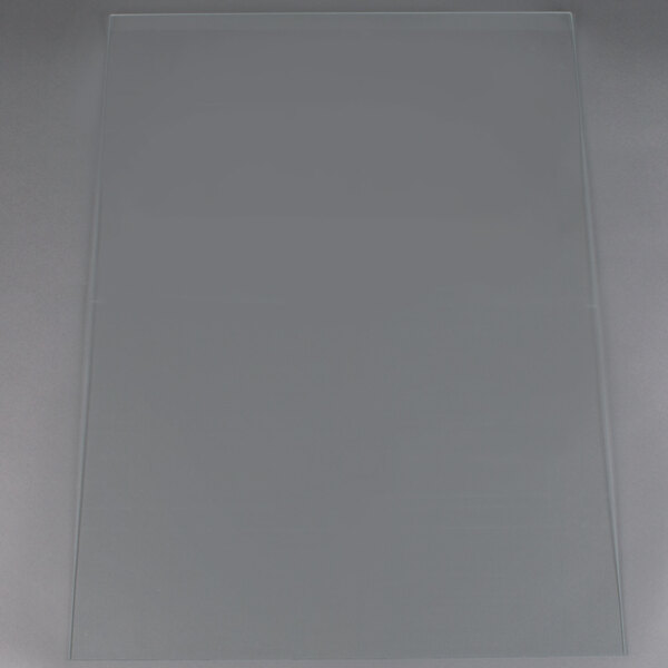 A clear glass front assembly for a Paragon popcorn popper.