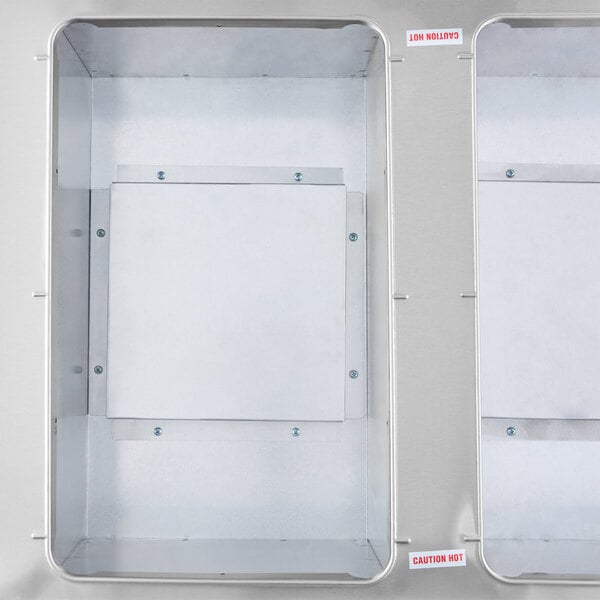 A stainless steel two-pan natural gas powered hot food table with open wells.