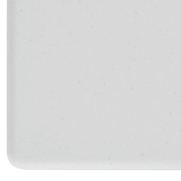 A white square Vollrath Miramar stone resin template with small dots on the surface.