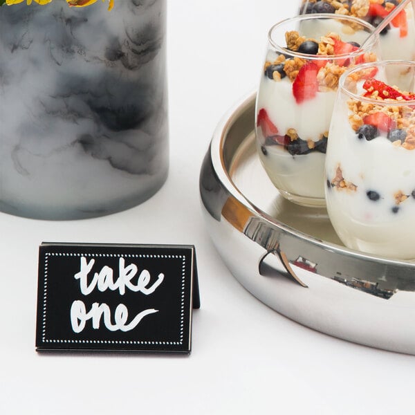A Cal-Mil chalkboard tabletop tent with "yogurt and fruit" written on it.