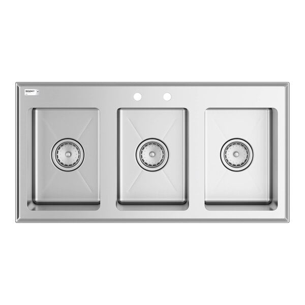 A stainless steel sink with three rectangular compartments and two faucet holes on the back edge.