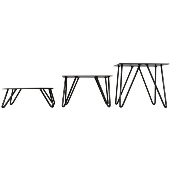 A black metal Cal-Mil rectangular riser set with V-shaped legs.