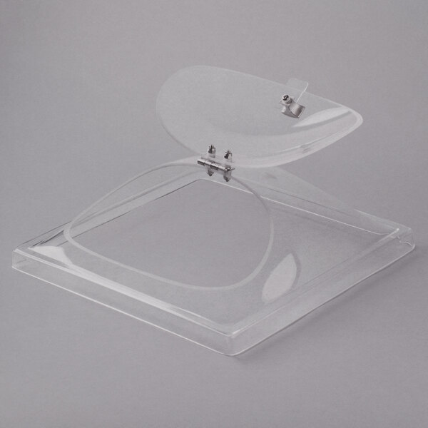 A clear plastic cover with a metal clip on top of a Cal-Mil Cold Concept display box.
