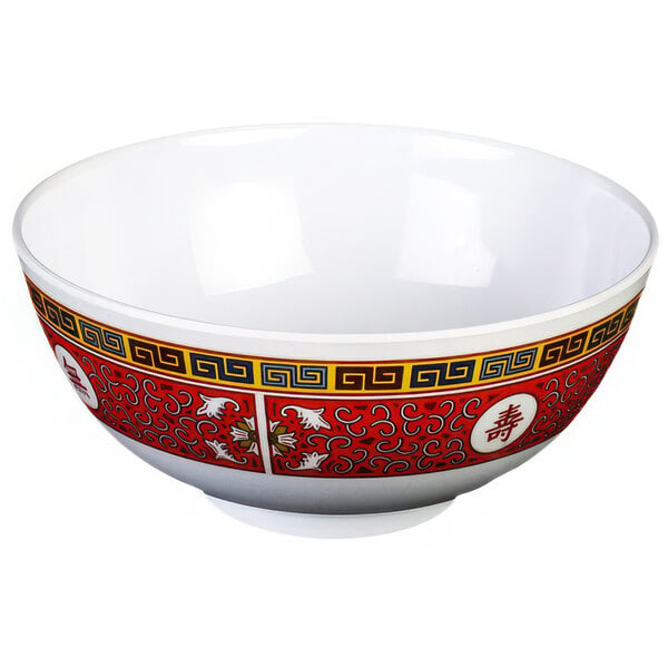 A white Thunder Group Longevity melamine rice bowl with red and yellow oriental designs.