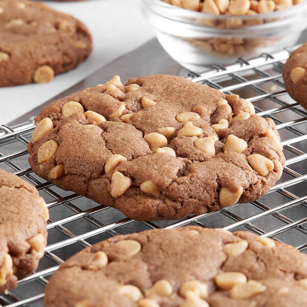 A REESE'S peanut butter cookie on a cooling rack.