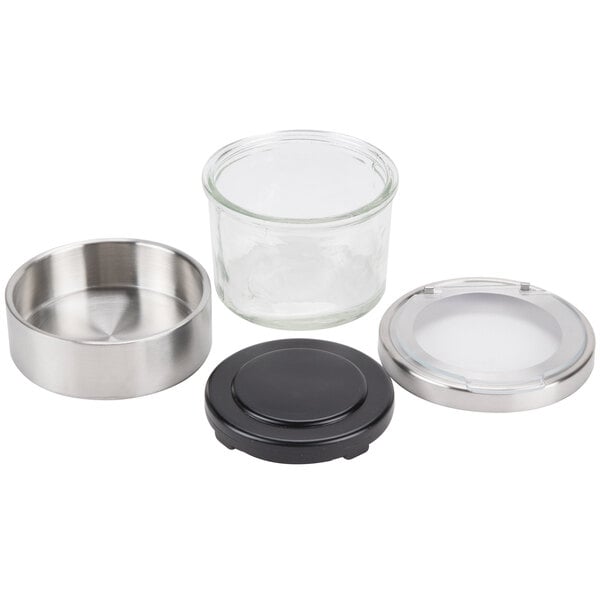 A Cal-Mil stainless steel tiered display with glass jars and clear lids.