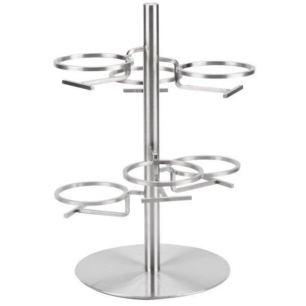 A metal Cal-Mil tiered stand with circular rings on it.
