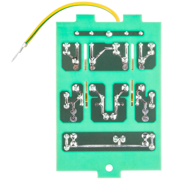A green circuit board with yellow and silver wires.