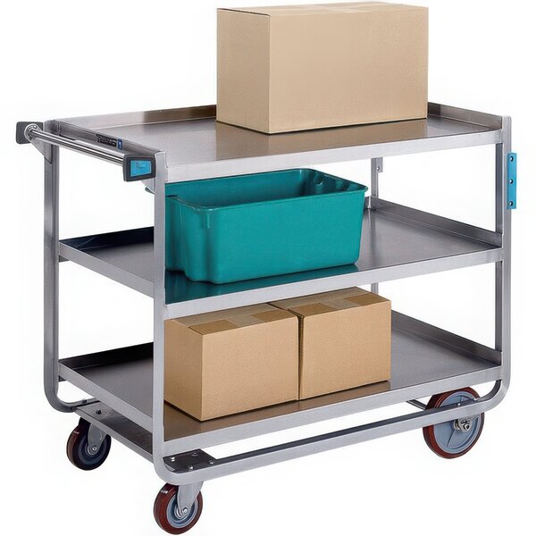 A Lakeside stainless steel three-shelf utility cart with boxes on it.