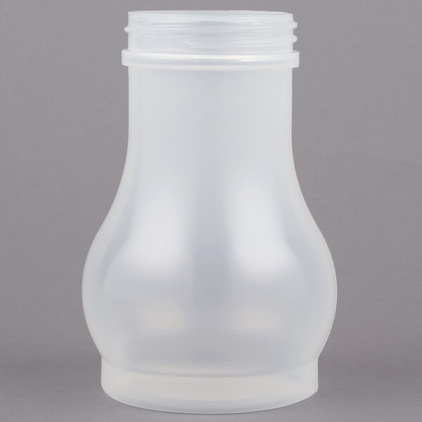A clear plastic Tablecraft syrup dispenser jar with a black lid.