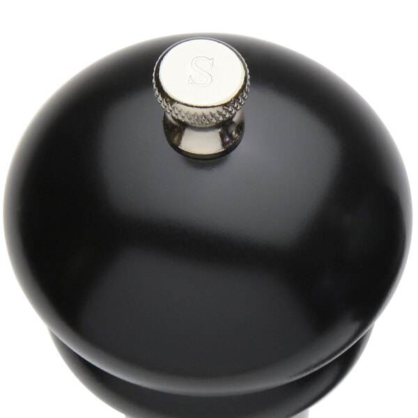 A Chef Specialties Imperial Ebony salt mill with a silver metal cap.