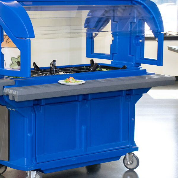 A blue tray rail on a Cambro food buffet cart.