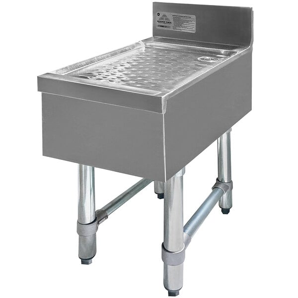 A large rectangular stainless steel sink with a drain on top.