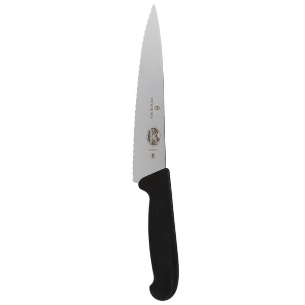 A Victorinox chef knife with a black handle.