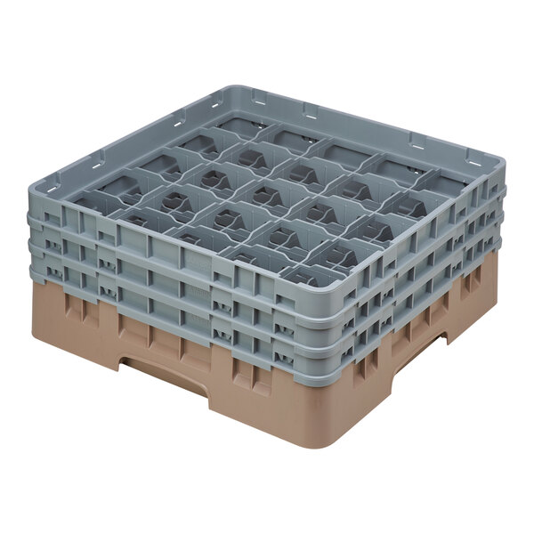 A beige plastic Cambro glass rack with many compartments.