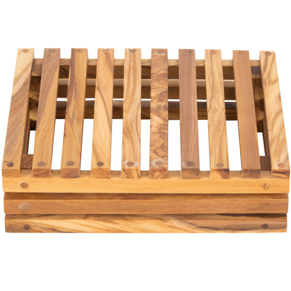 An American Metalcraft olive wood bread crate with slats.