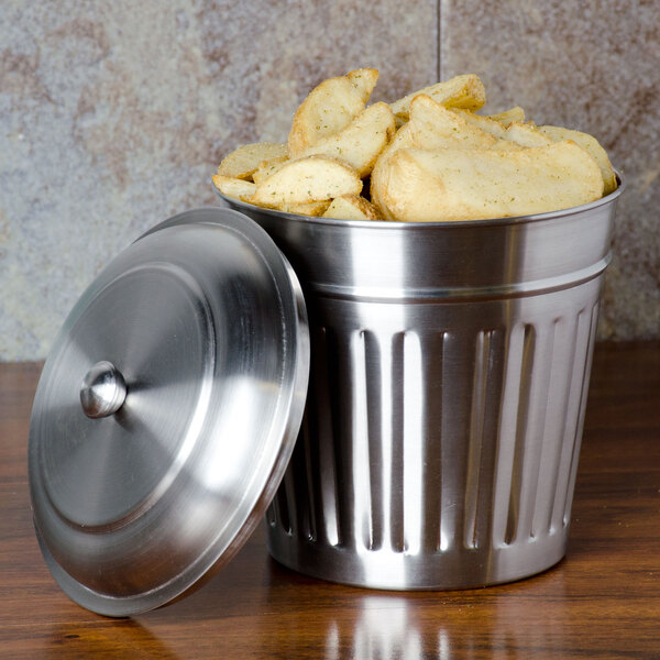A silver American Metalcraft mini trash can lid on a metal canister full of chips.