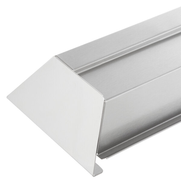 A close-up of a stainless steel metal speed rail.