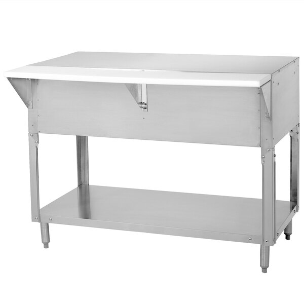 A stainless steel Advance Tabco food table with an undershelf on a counter.