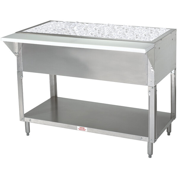 A stainless steel Advance Tabco ice-cooled table with an ice bucket on top.