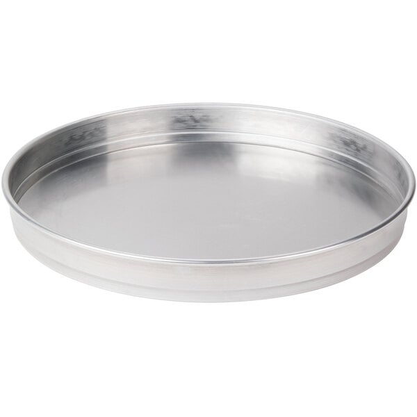 An American Metalcraft round silver aluminum cake pan.