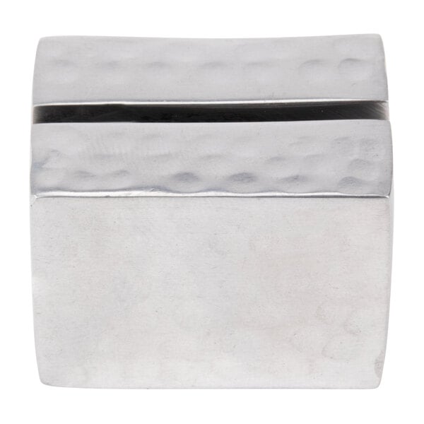 A rectangular silver metal card holder with a square design.