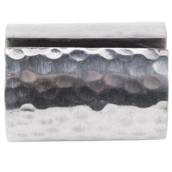 An American Metalcraft hammered aluminum table card holder with a metal surface.