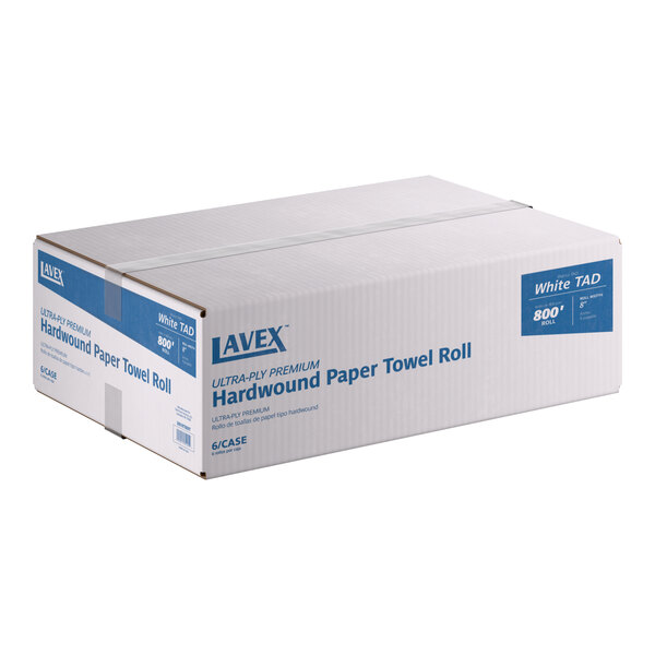A case of Lavex Premium 8-inch white hardwound paper towel rolls, containing six 800-foot rolls.