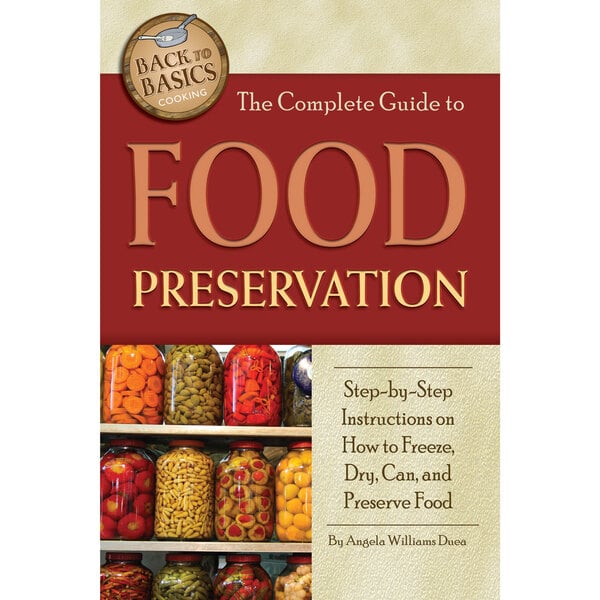 The Complete Guide to Food Preservation book cover with a glass jar full of food.