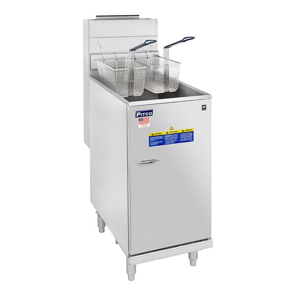 A Pitco stainless steel floor gas fryer with several baskets inside.