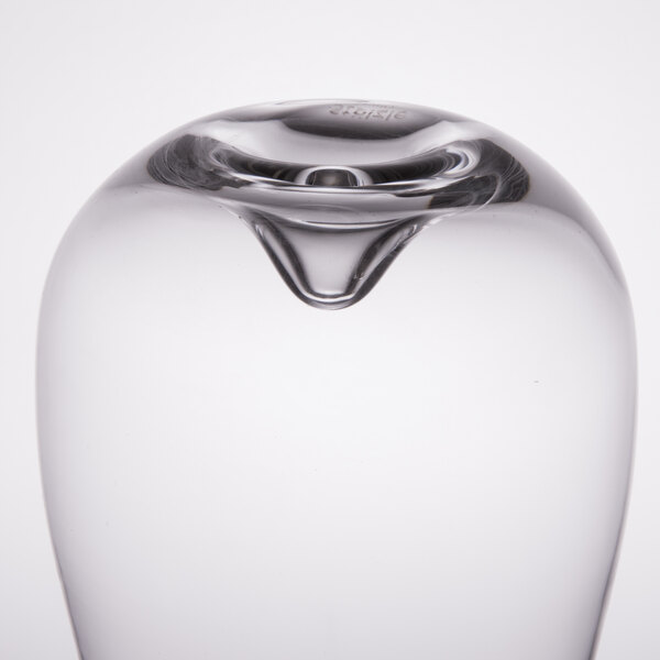 A close up of a clear Stolzle Vulcano stemless wine glass.