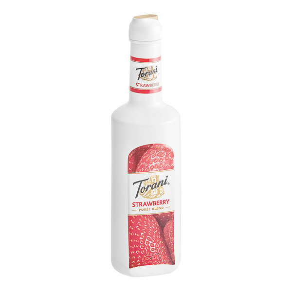 A white Torani bottle of strawberry puree with a red and white label.