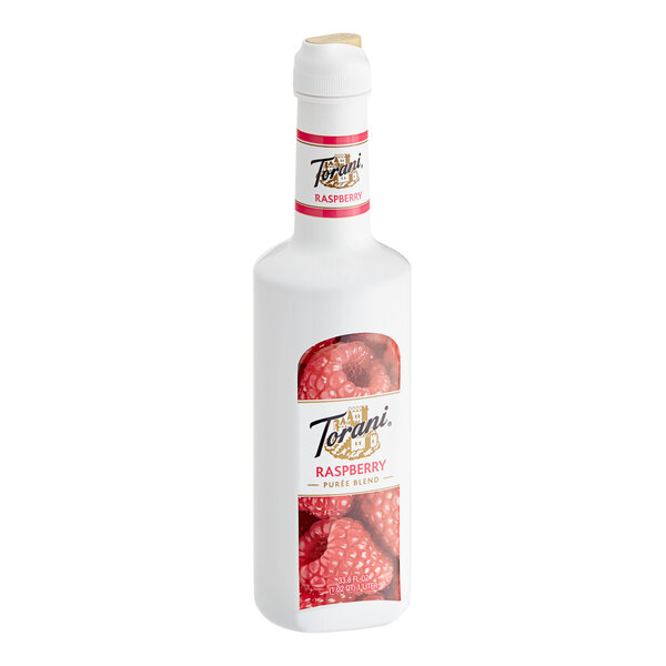 A white bottle of Torani Raspberry Puree Blend with a red and white label.