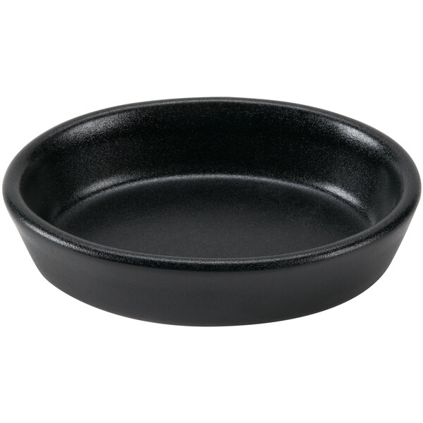 A black oval china baker dish.