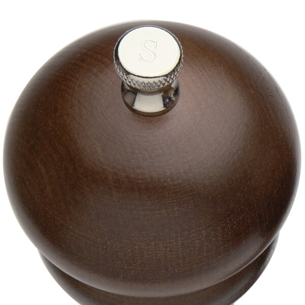 A Chef Specialties salt mill with an Imperial walnut finish and a silver top.