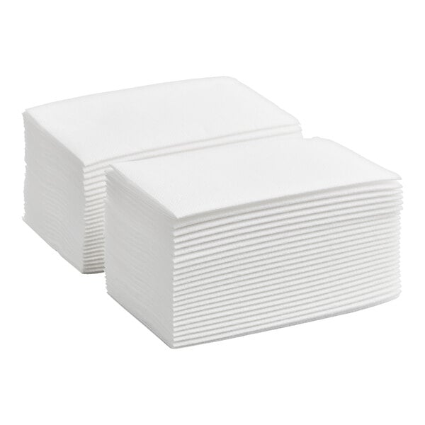 A stack of white linen-feel 1/8 fold dinner napkins.