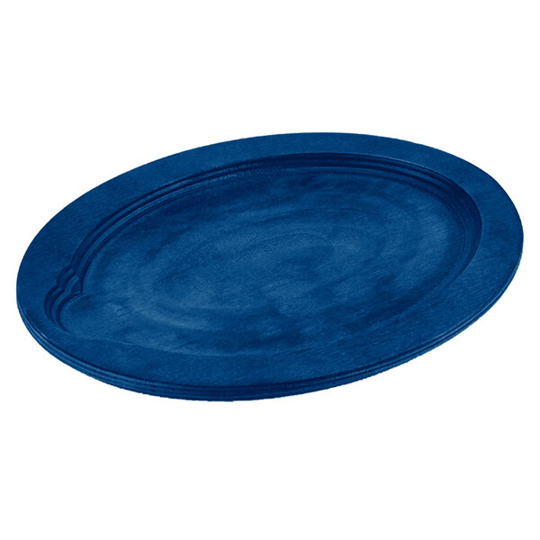 A Lodge cobalt blue oval wood underliner with a circle in the middle.