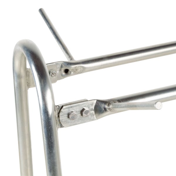 A white metal frame with two hooks on it.
