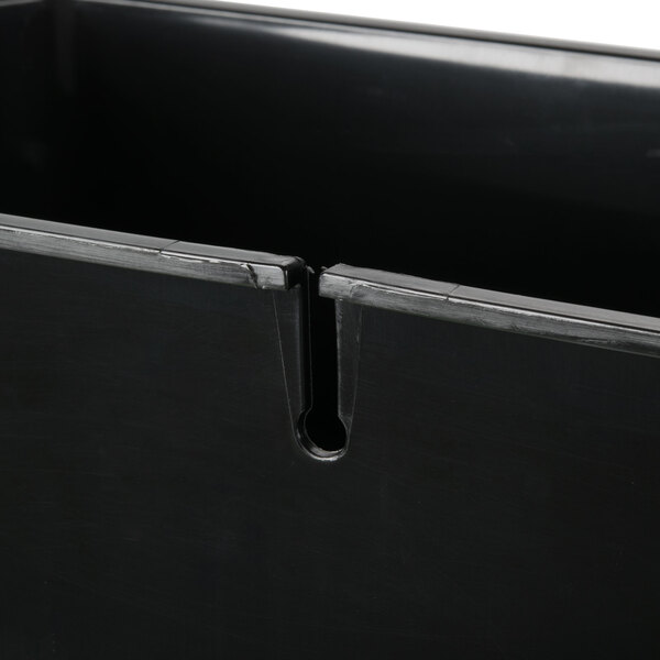 A black rigid plastic container with a handle.