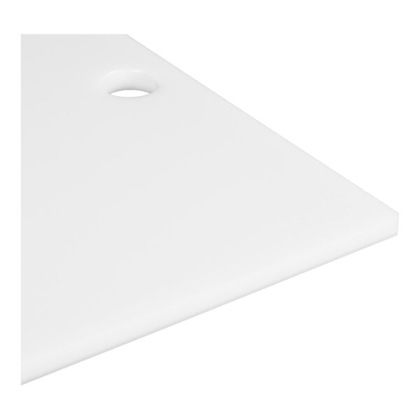 A white rectangular plate with a rounded corner and a circular hole near one edge.
