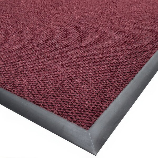 A burgundy Cactus Mat Ultra-Berber carpet mat with a black border.