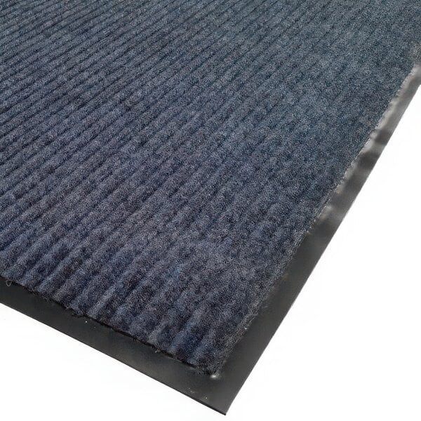 A blue needle rib Cactus Mat carpet mat with black rubber strips.